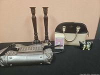 Group shot showing Kate Spade bag and B. Makowsky wallet-clutch with other background items