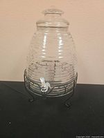 assembled beverage dispenser on stand with lid