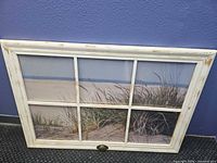 Front view showing entire framed artwork
