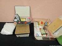 Overall view of storage boxes, fiberfill bag, clear bin with craft supplies