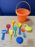 Full set showing bucket, shovels, rake, mold and spray bottle