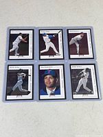All six Fleer Premium 2001 cards in toploaders displayed