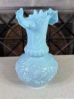Full view of light blue glass vase front