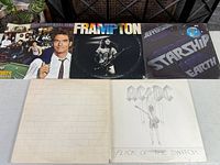 All five LP covers displayed, top and bottom rows