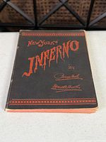 Front cover of book showing title and author signature facsimile