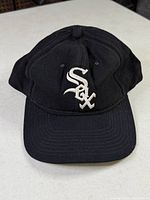 Front view showing Chicago White Sox logo and overall cap shape