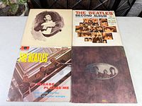 All four album fronts: Johnny Cash, Beatles Please Please Me, Beatles Second Album, Beatles Love Songs