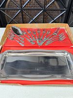Full boxed set showing tray, cake server and forks