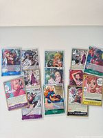 Group shot of all 13 sleeved One Piece cards