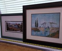 Both framed prints side by side showing frames and mats