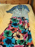 All three tops laid out showing styles and colors