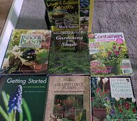All seven gardening hardcovers displayed front covers visible