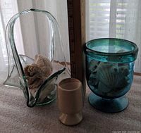 Overall lot: aqua glass vase, green art glass bowl, stone egg cup