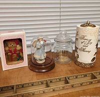 Group shot of all four items on tabletop with ruler for scale