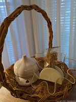 All items grouped in basket: roaster, skewers, napkin holder