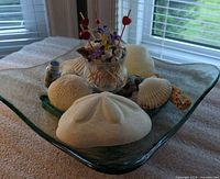 Entire centerpiece showing bowl, shells, toothpick holder