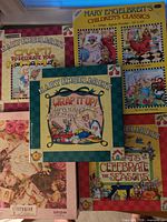 Group shot showing both puzzle boxes and three craft books