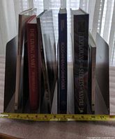 Front view of metal organizer holding books