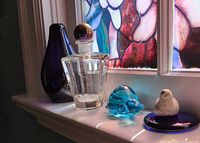 Group of all four glass items on windowsill