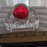 Red bubble glass ball on cut crystal holder