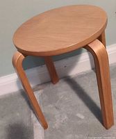 Top and side view of round birch veneered plywood table