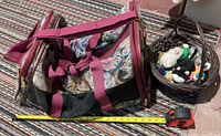 Pet carrier full view with shoulder strap, floral tapestry panels, tape measure for scale