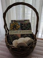 Basket with books and lifters inside