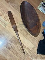 Top view of bowl and paddle showing size and shape