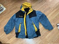 Full view front of Columbia coat laid flat
