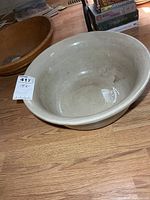 Top view of large beige stoneware mixing bowl