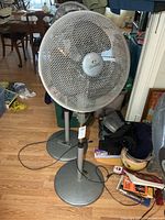 Front view of WindChaser pedestal fan standing on circular base