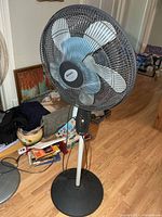 Full view of Holmes pedestal fan on stand