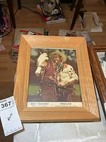 Front view of framed Roy Rogers and Trigger photo on table