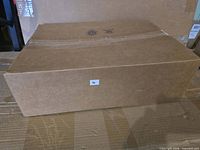 Sealed corrugated cardboard shipping box