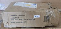 Damaged shipping box showing Sporzon branding and 10LB pair label