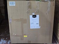 Sealed cardboard shipping box containing cushion set