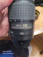 Lens showing zoom range markings and model information