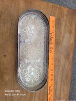 Full view of tray with ruler for scale