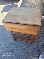 Tea table folded with leaves down, showing top and slatted shelf