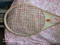Head of laminated wooden tennis racket with strings