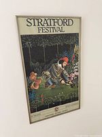 Full view of framed Stratford Festival poster on wall