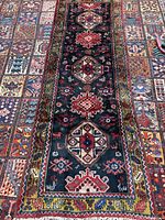 Full view of Hamdan runner rug on patterned floor