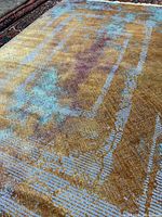 Full view of silk rug showing abstract pattern and sheen