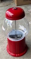 Full view of red gumball machine