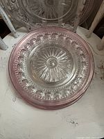 Top view of plate highlighting starburst center and thumbprint pattern