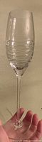 Full view of single wave-etched champagne flute