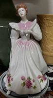 Front view of Royal Doulton November figurine