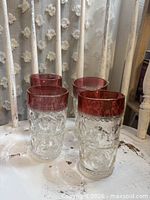 Four King’s Crown tumblers angled view