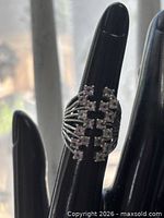 Front view showing amethyst stone cluster and prong layout