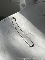 Full view of anklet on display form